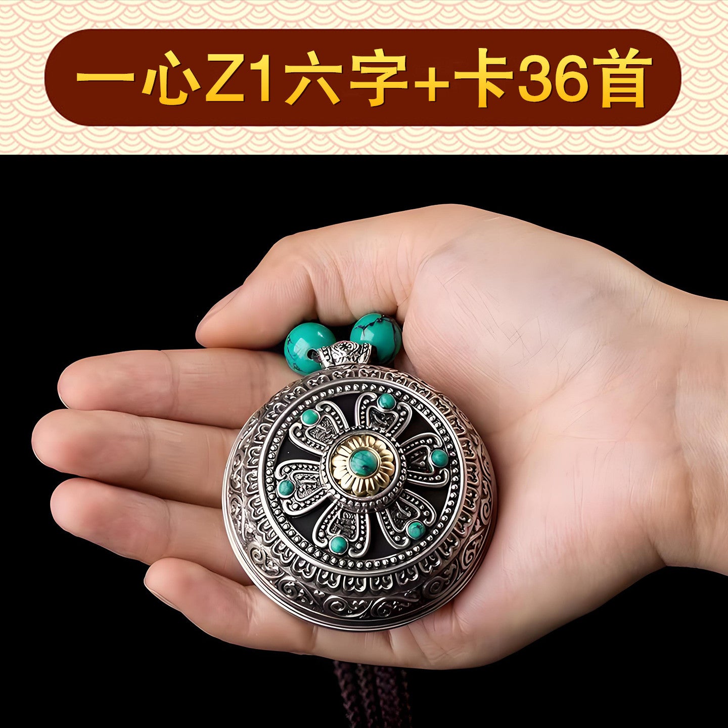 Z1 silver-tone music pendant, with six ornamental panels and seven green accents on the face, shown in hand.