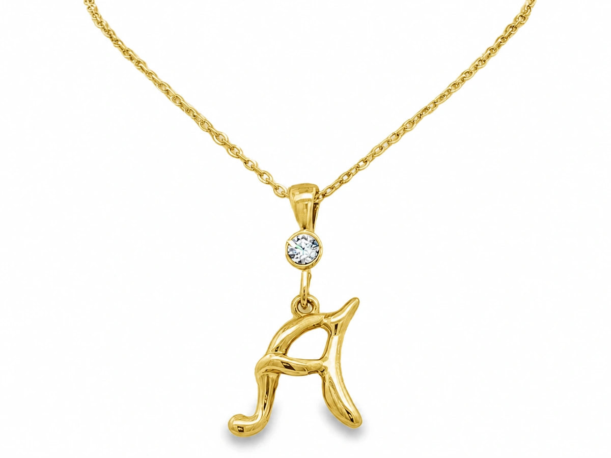 Gold A initial necklace with a clear birthstone